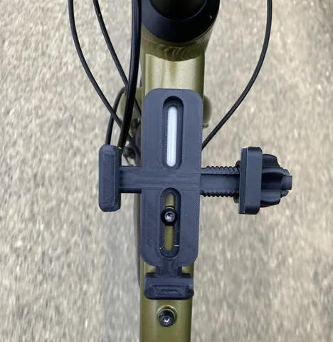Phone bike mount on standard water bottle mount